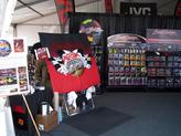 Inside the Pep Boys booth.  The airbrushed hood is not quite finished on display.