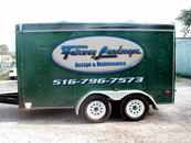 LANDSCAPING TRAILER WITH COMPANY LOGO