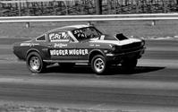 The Hugger Mugger Mustang, racing at National Speedway in 1967.  Originally LETTERED by Gary, "The Local Brush"