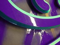 DETAIL shows the Metalflake glitter in the purple paint.
