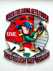 DETAIL of East Farmingdale VF company patch is high above the doors of the cab.