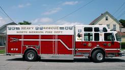 GARY, AIRBRUSHED an Eagle & American flag behind the back doors of the Heavy Reccue Truck