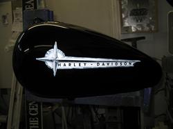 Gary, The Local Brush, Airbrushed the Harley Davidson emblem.  The faux chrome looks amazingly real.