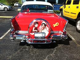 COMPLETED PORTRAITS on the back of a 1957 Chevrolet
