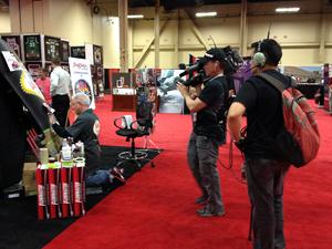 The SPEED CHANNEL crew filming Gary as he works on at the Barrett Jackson Auction
