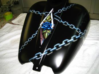 Gary, the Local Brush, airbrushed the Harley tank with so much detail you can see the threads of the bolts.