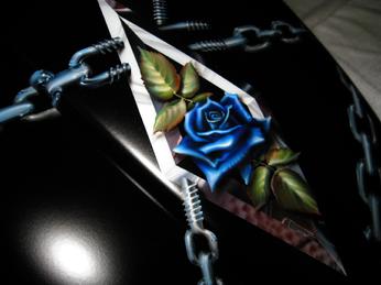 Gary the Local Brush airbrushed the Harley tank with so much detail you can see the threads of the bolts.