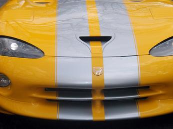 SILVER STRIPES PAINTED ON A YELLOW DODGE VIPER